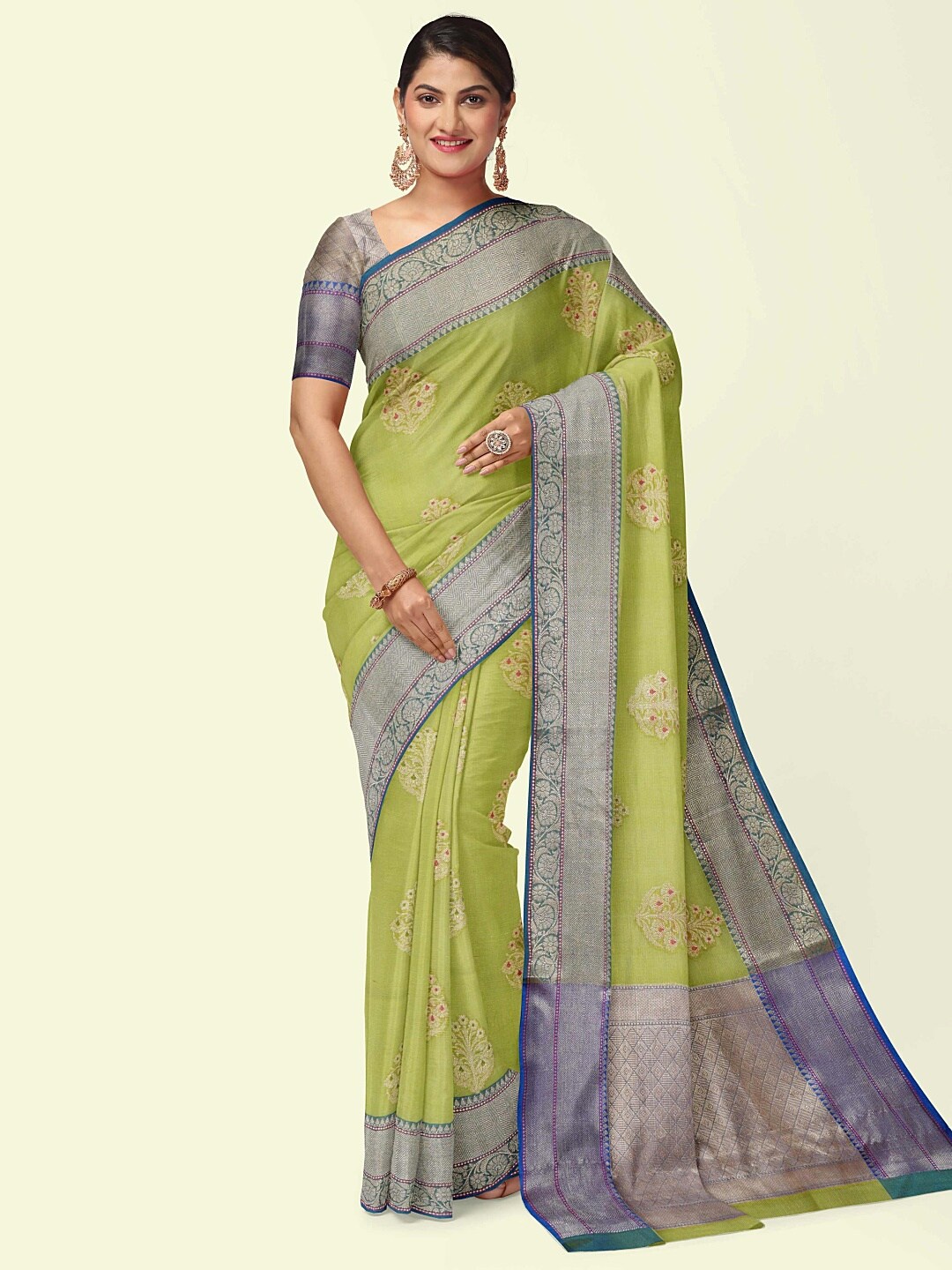 

PTIEPL Banarasi Silk Works Green & Blue Ethnic Motifs Zari Banarasi Saree