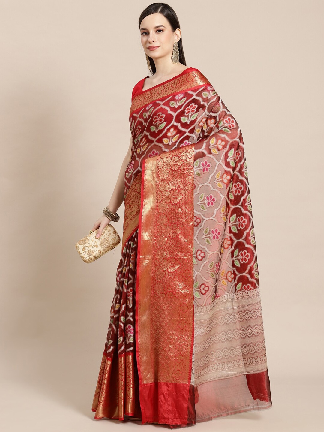 

PTIEPL Banarasi Silk Works Floral Woven Design Zari Art Silk Ikat Saree, Maroon