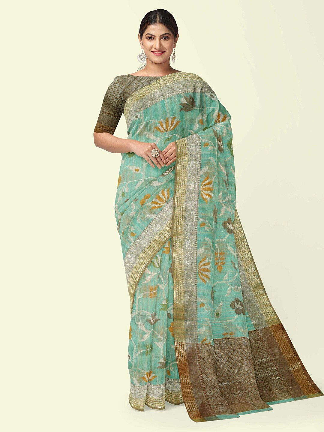 

PTIEPL Banarasi Silk Works Floral Woven Design Zari Banarasi Saree, Sea green