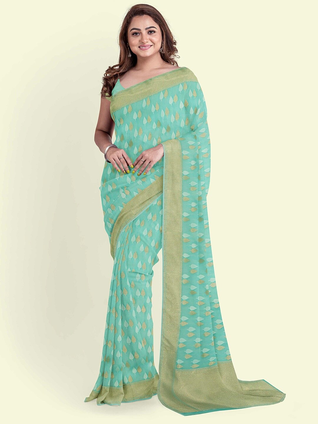 

PTIEPL Banarasi Silk Works Floral Woven Design Zari Banarasi Saree, Sea green