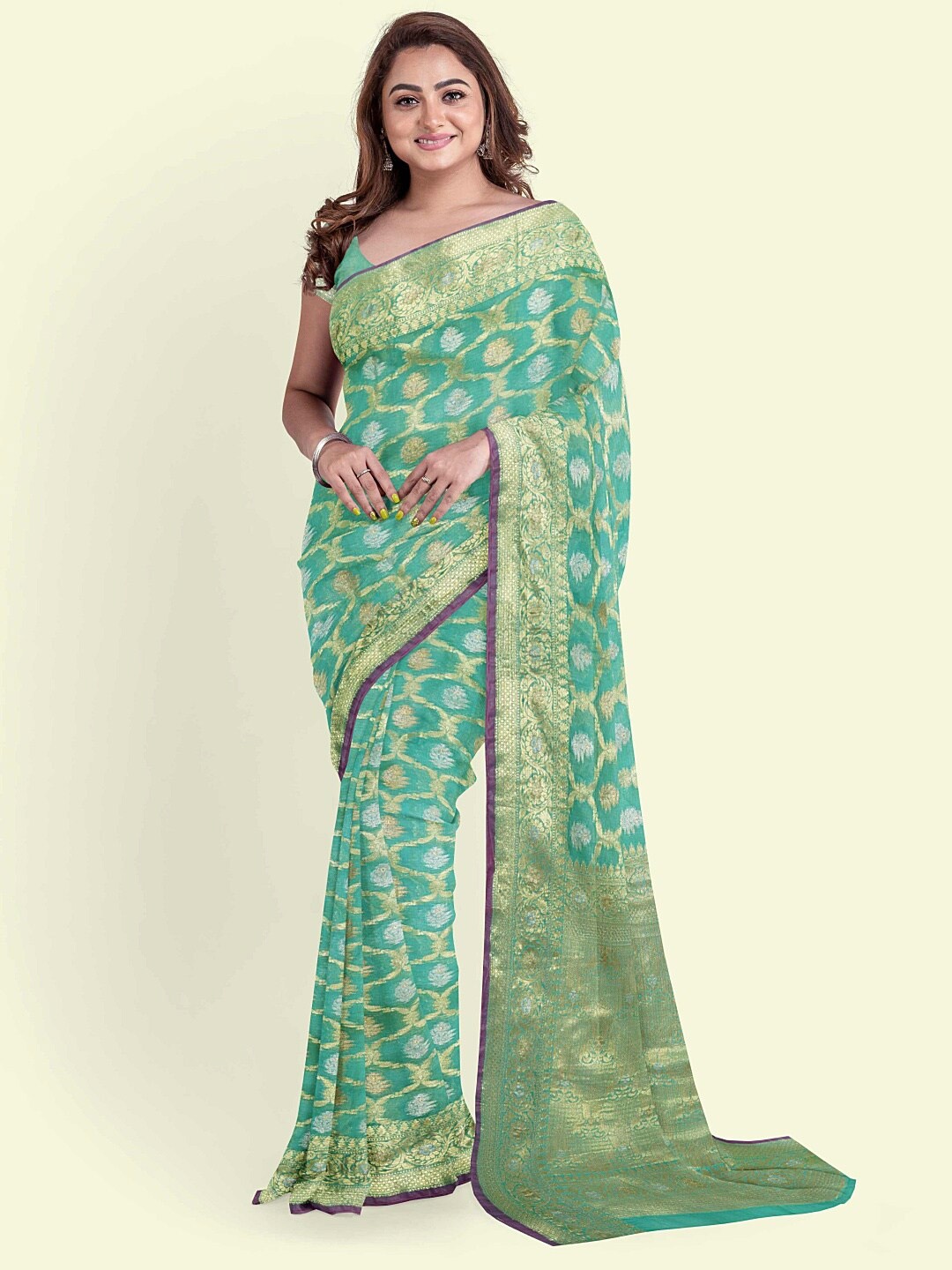 

PTIEPL Banarasi Silk Works Ethnic Motifs Woven Design Zari Banarasi Saree, Sea green