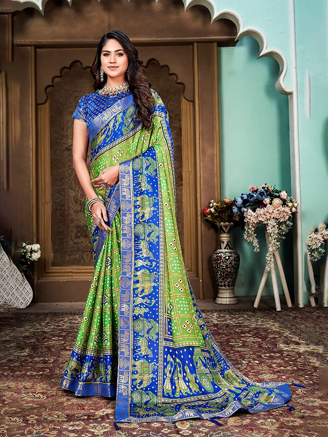 

Mitera Green & Blue Bandhani Zari Silk Cotton Saree