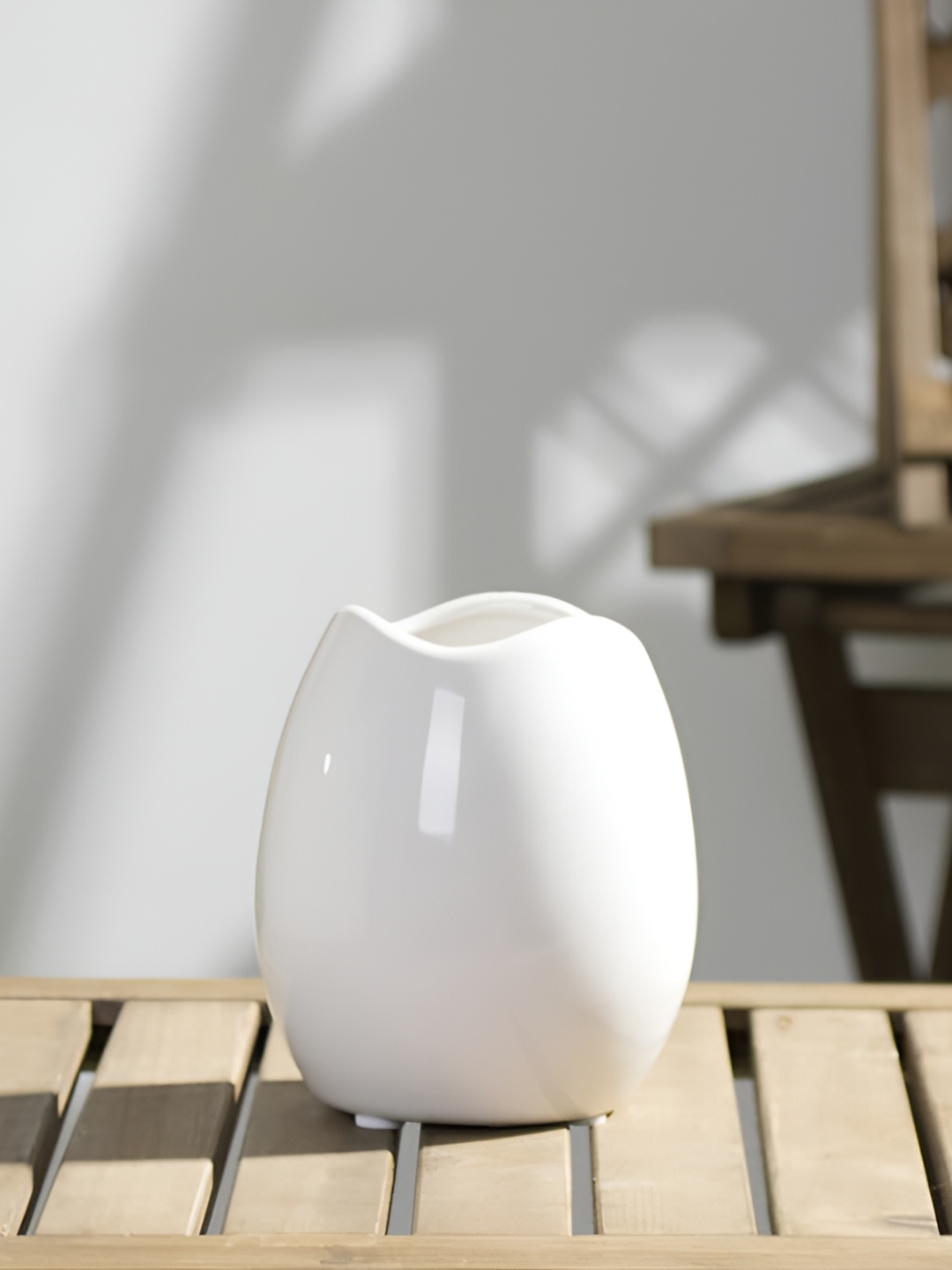 

Satyam Kraft White Ceramic Flower Vase