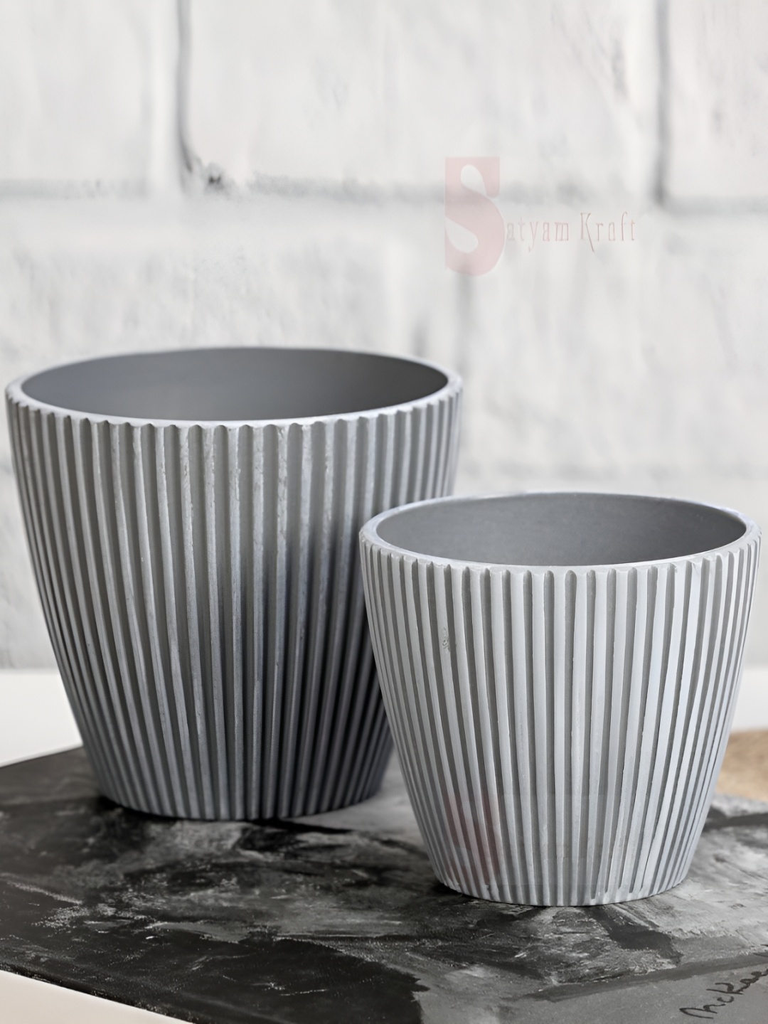 

Satyam Kraft Grey 2 Pieces Textured Unbreakable Vases