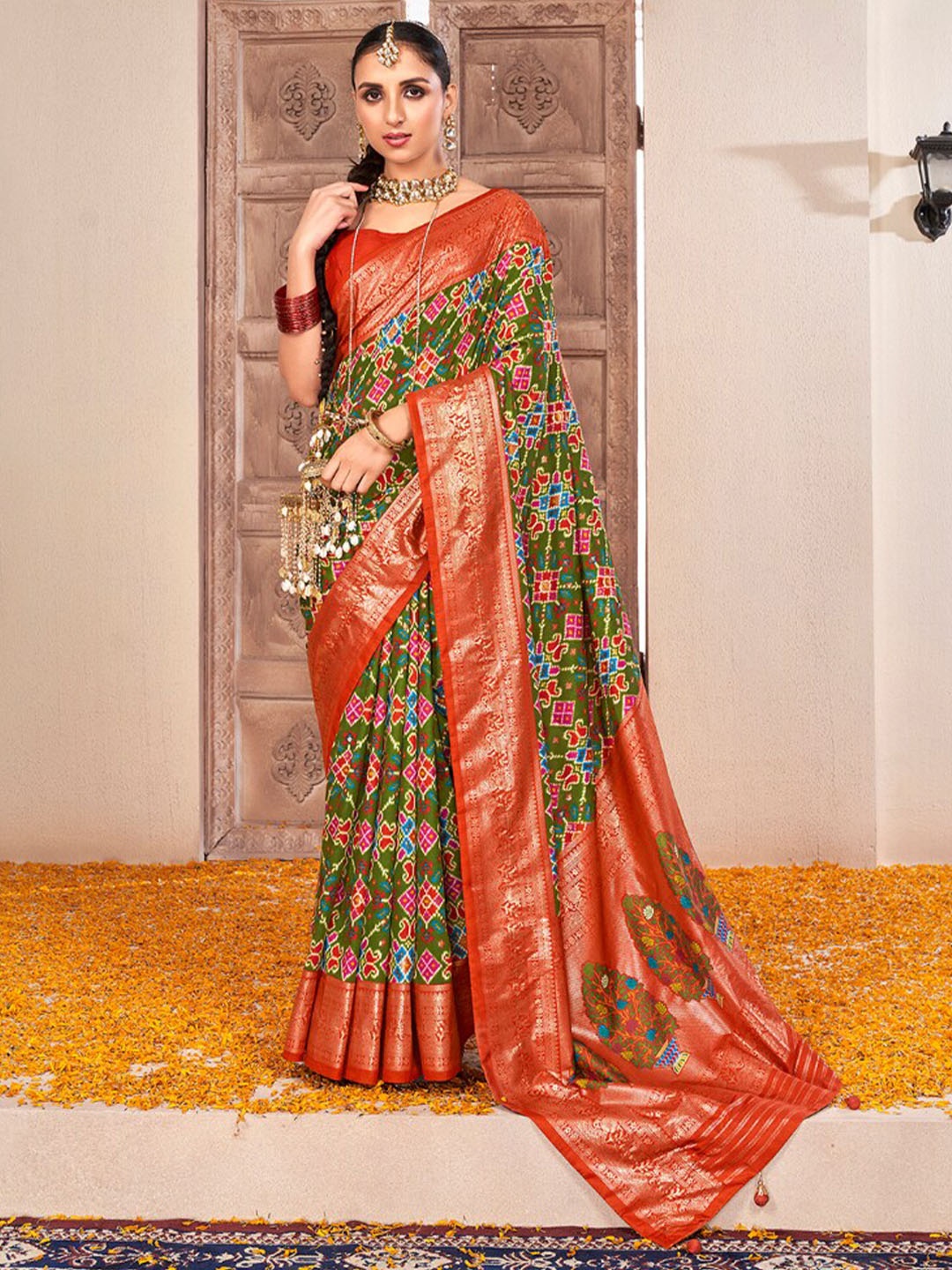 

Mitera Green & Red Ethnic Motifs Woven Design Zari Silk Cotton Saree
