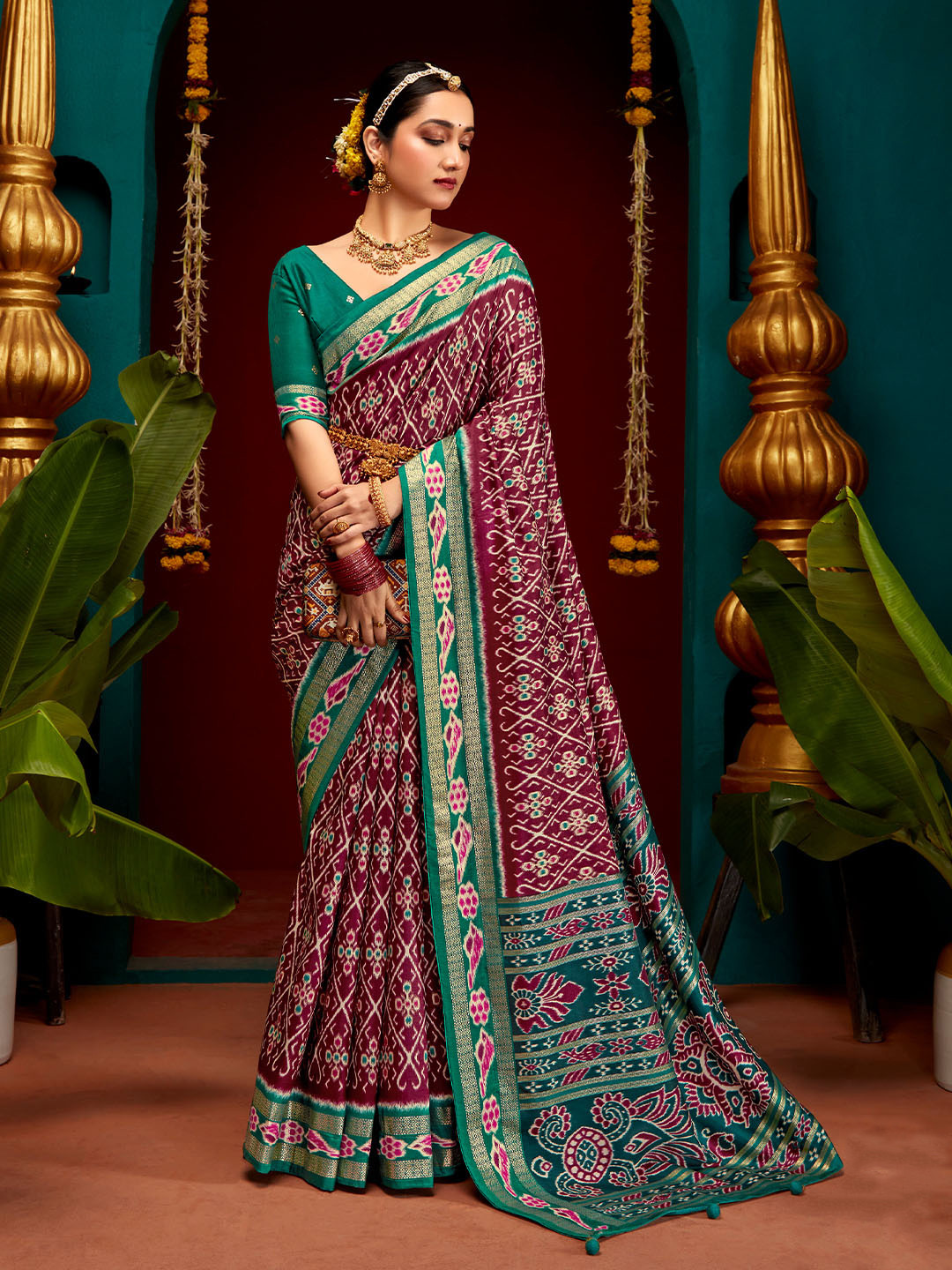 

Mitera Red & Green Ethnic Motifs Zari Silk Cotton Saree