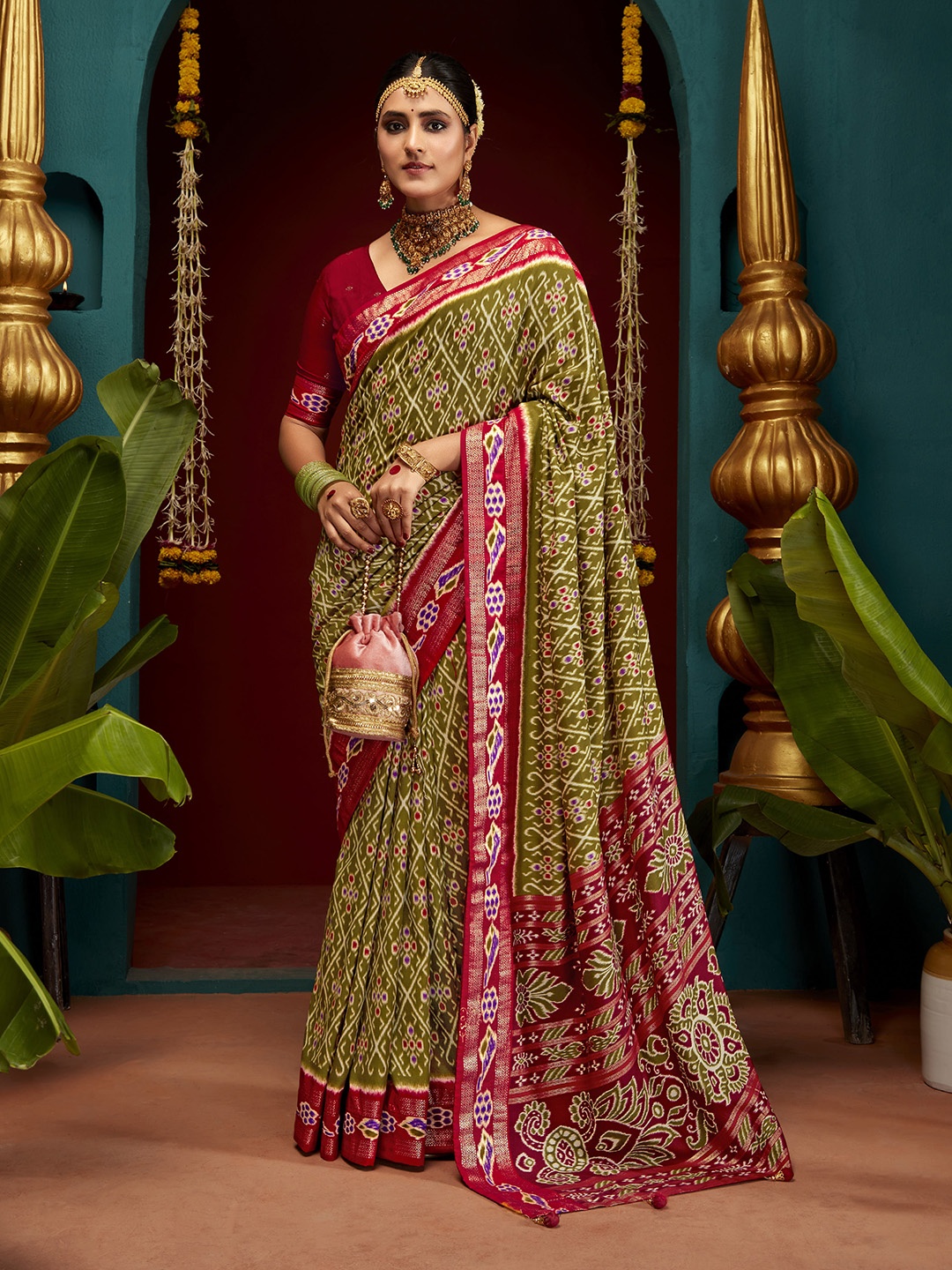 

Mitera Green & Red Ethnic Motifs Zari Silk Cotton Saree