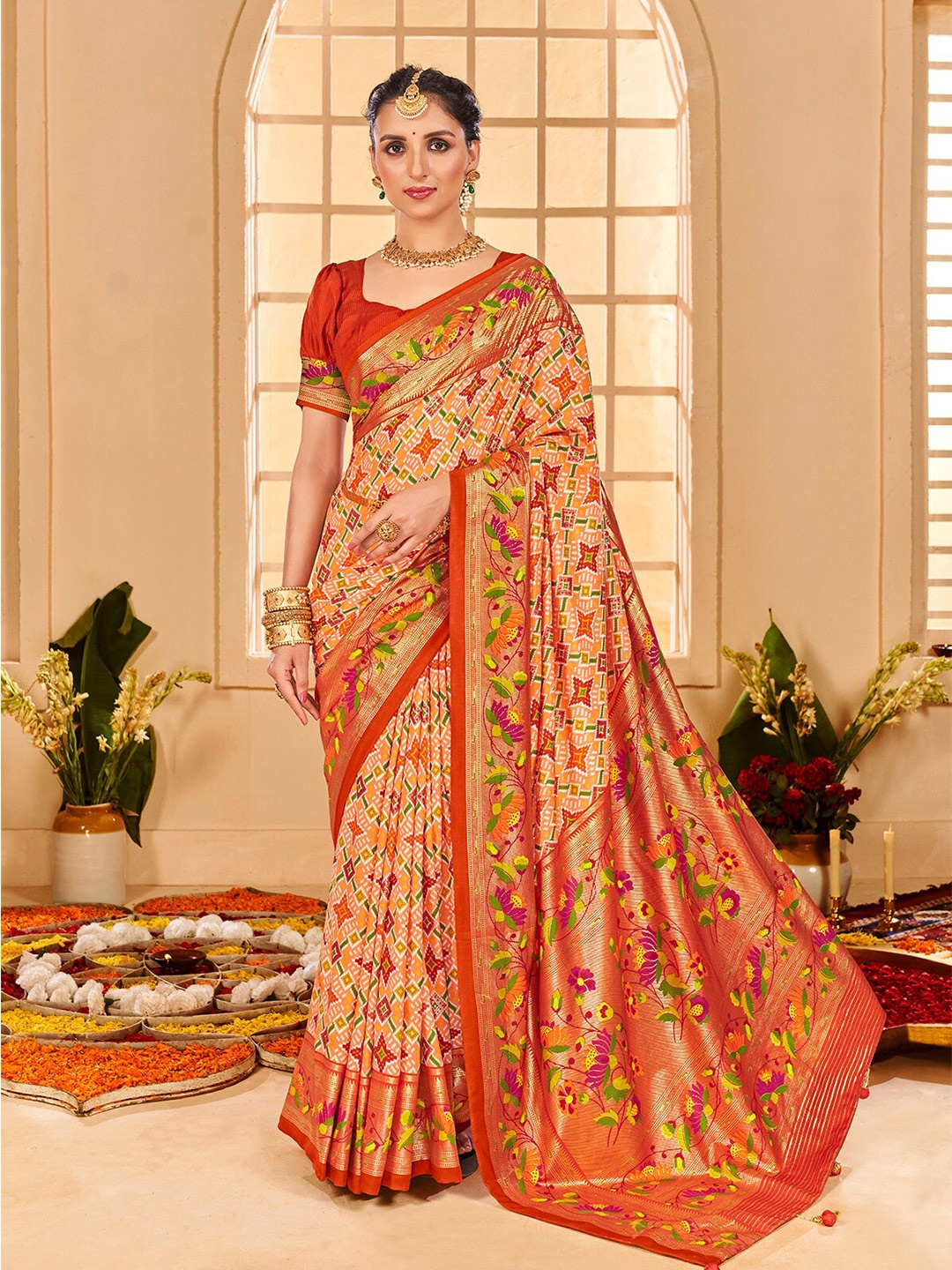 

Mitera Orange & Green Ethnic Motifs Zari Silk Cotton Saree