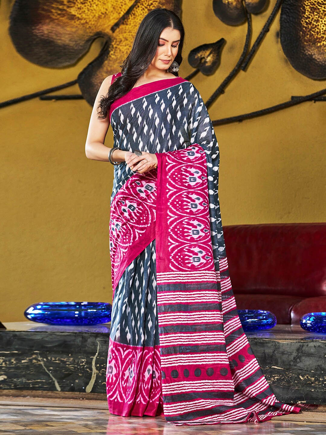 

Mitera Grey & White Ethnic Motifs Printed Ready to Wear Ikat Saree