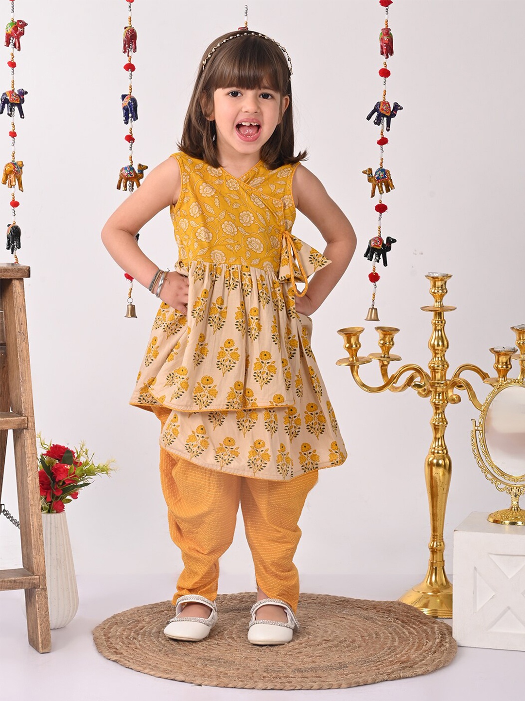 

Here&Now X Kinder Kids Girls Floral Printed Sleeveless Pure Cotton Kurta with Dhoti Pants, Mustard