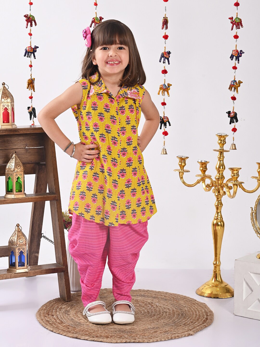 

Here&Now X Kinder Kids Girls Floral Printed Shirt Collar Sleeveless Pure Cotton Kurta & Dhoti Pants, Yellow