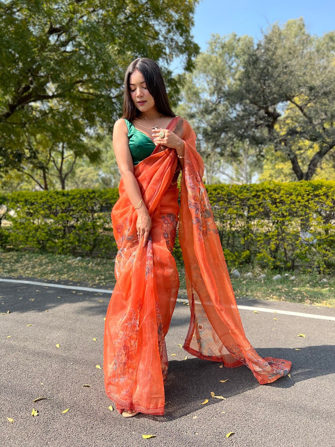 

Mitera Orange Floral Printed Organza Saree