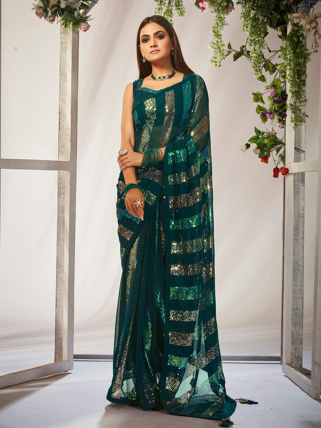 

Mitera Green & Gold Toned Embellished Sequinned Pure Georgette Saree