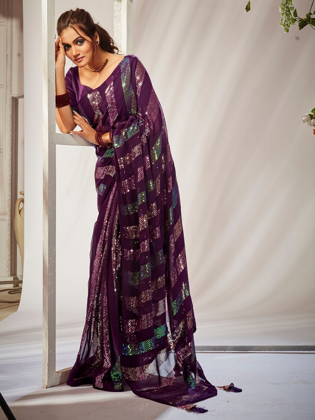 

Mitera Purple & Green Embellished Sequinned Pure Georgette Saree