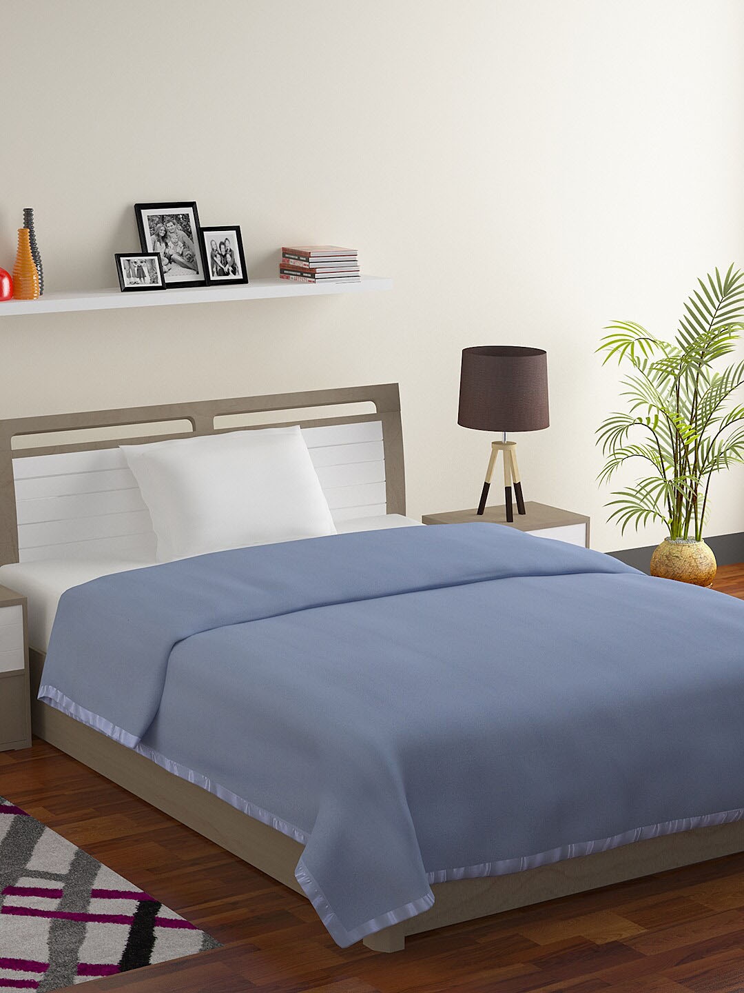 

BOMBAY DYEING Blue Solid AC Room 233 GSM Single Bed Blanket