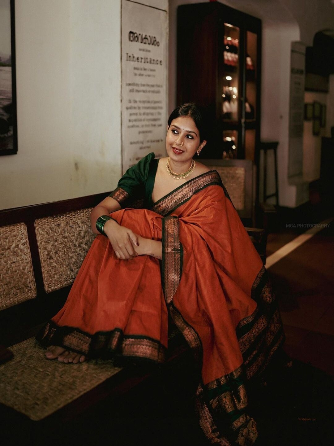 

Paramparik Textile Orange & Green Ethnic Woven Design Zari Cotton Gadwal Saree