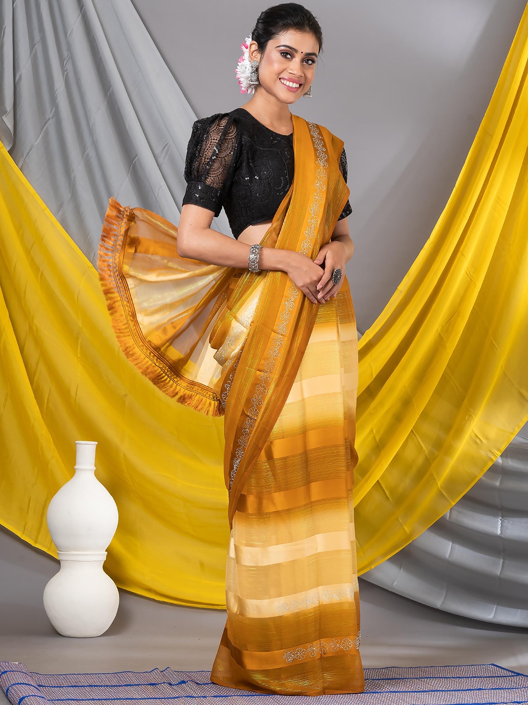 

MAHALASA Striped Embellished Beads And Stones Pure Georgette Saree, Mustard