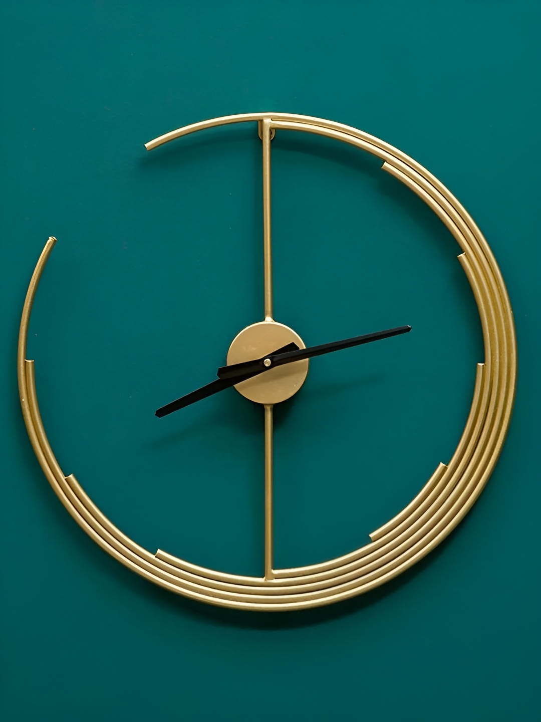 

Writings On The Wall Gold Toned Contemporary Wall Clock