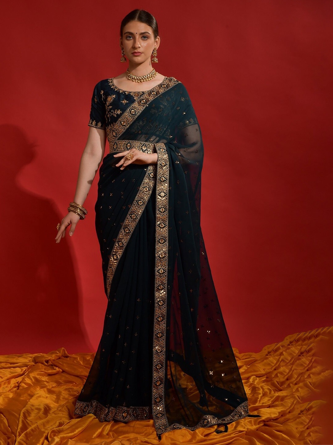 

Mitera Teal & Gold-Toned Ethnic Motifs Sequinned Embroidered Pure Georgette Belted Saree