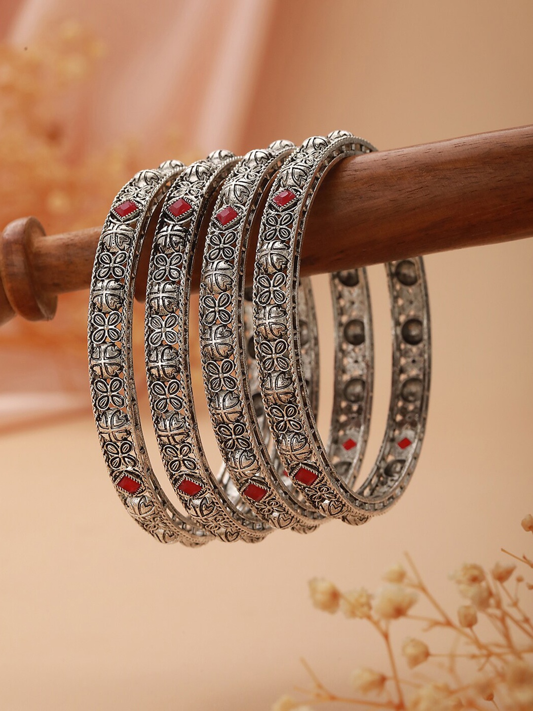 

Jazz and Sizzle Set Of 4 Silver-Plated Stone-Studded Oxidized Bangles