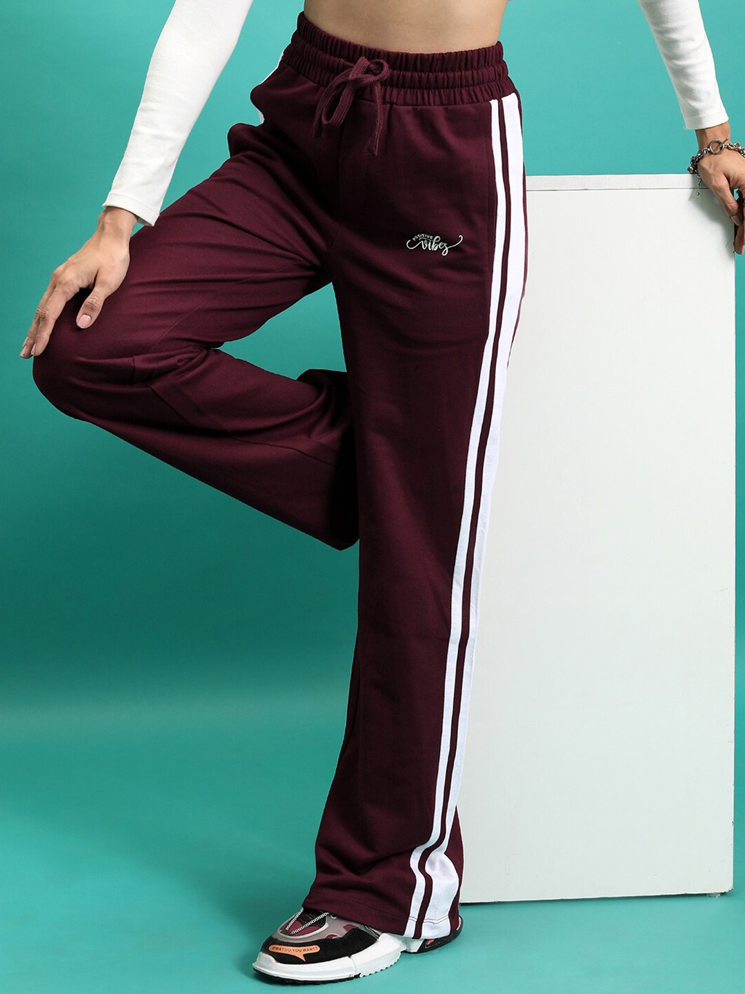 

Tokyo Talkies Women Burgundy Striped Flared Track Pant