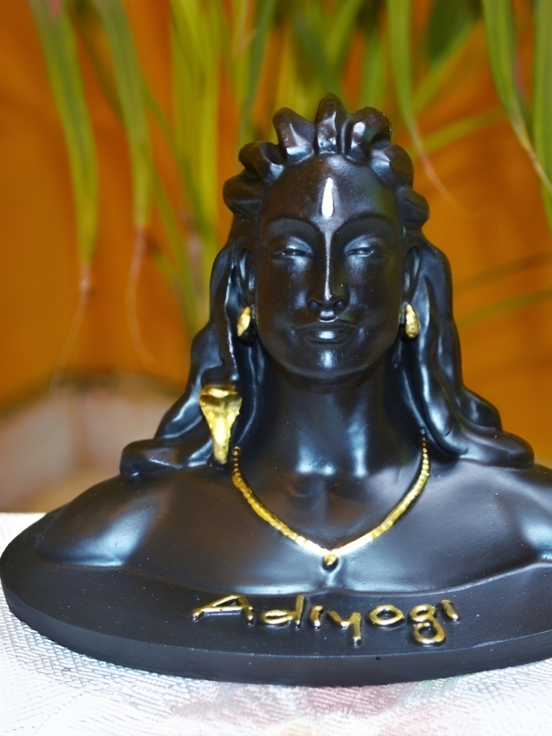 

Navyaksh Black and GoldToned Dhyana Mudra Adiyogi Shiva Idol Showpiece