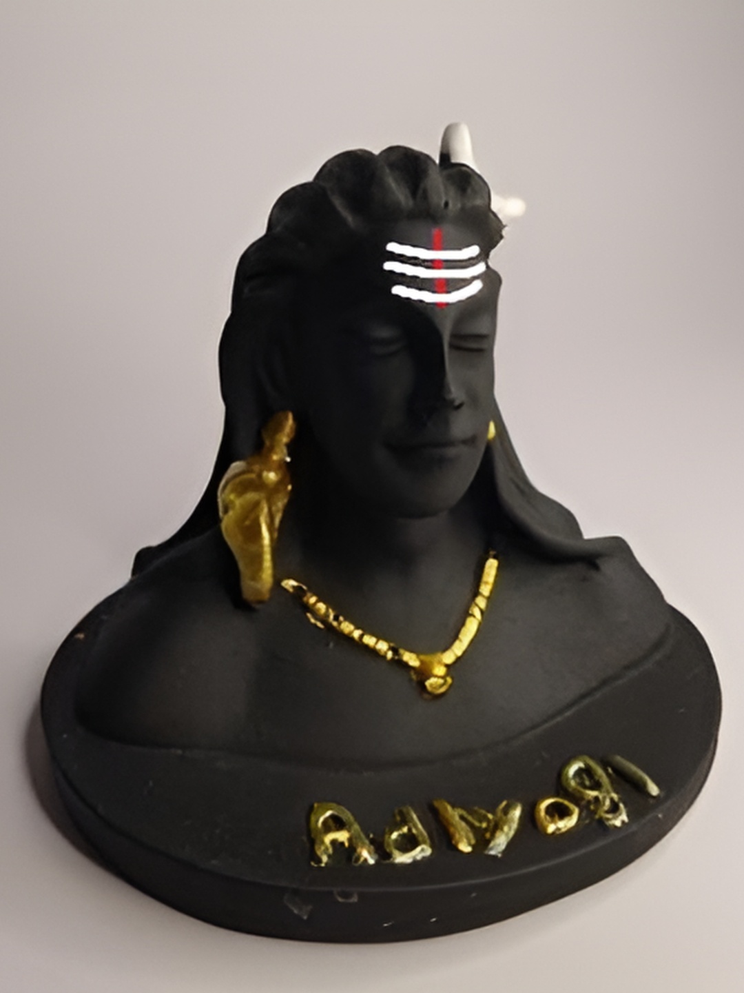 

Navyaksh Black & Gold Toned Religious Adiyogi Showpiece