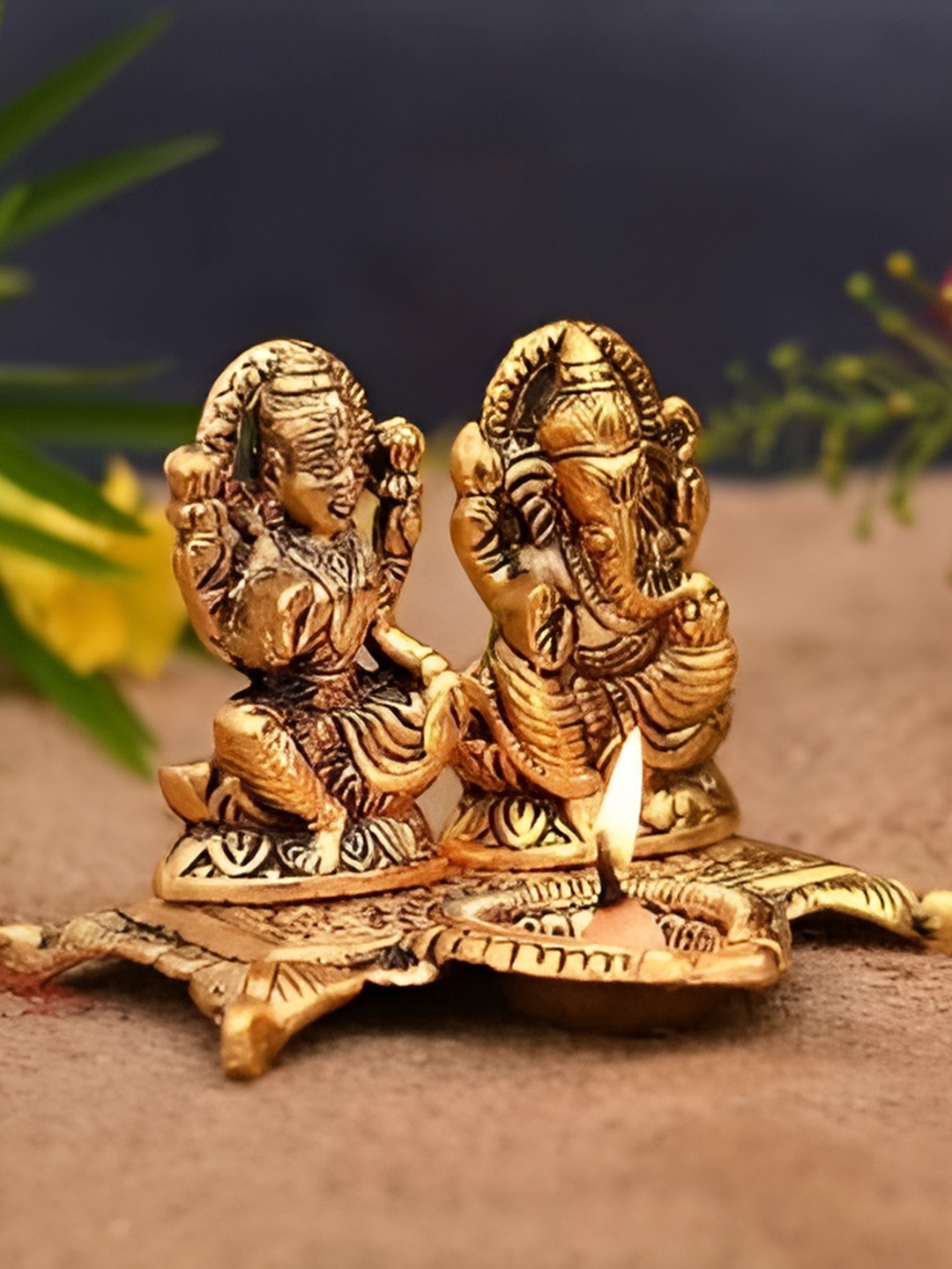

Navyaksh Gold-Tone Religious Laxmi Ganesh With Diya Statue Idol Murti Decorative Showpiece