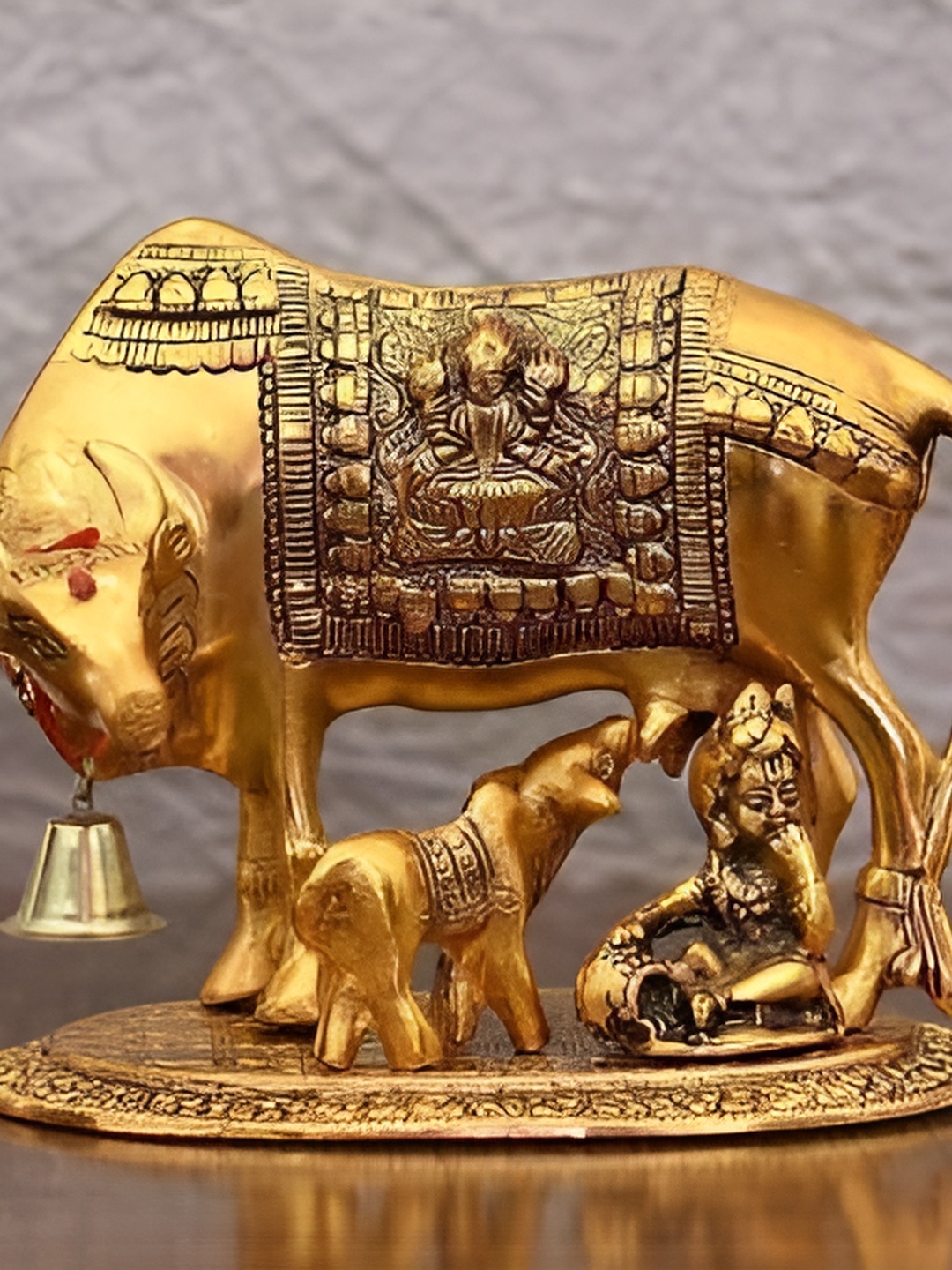 

Navyaksh Gold Toned Brass Cow And Calf kamdhenu Showpiece