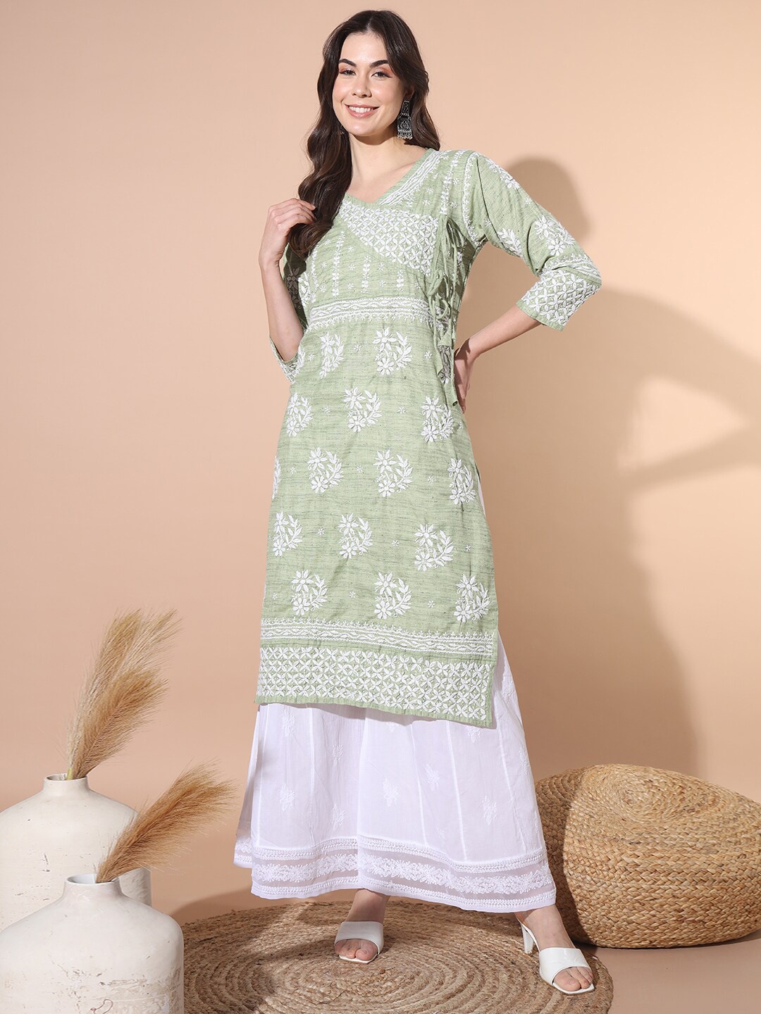 

Ethnava Floral Embroidered Tie Up Angrakha Kurta With Palazzos, Green