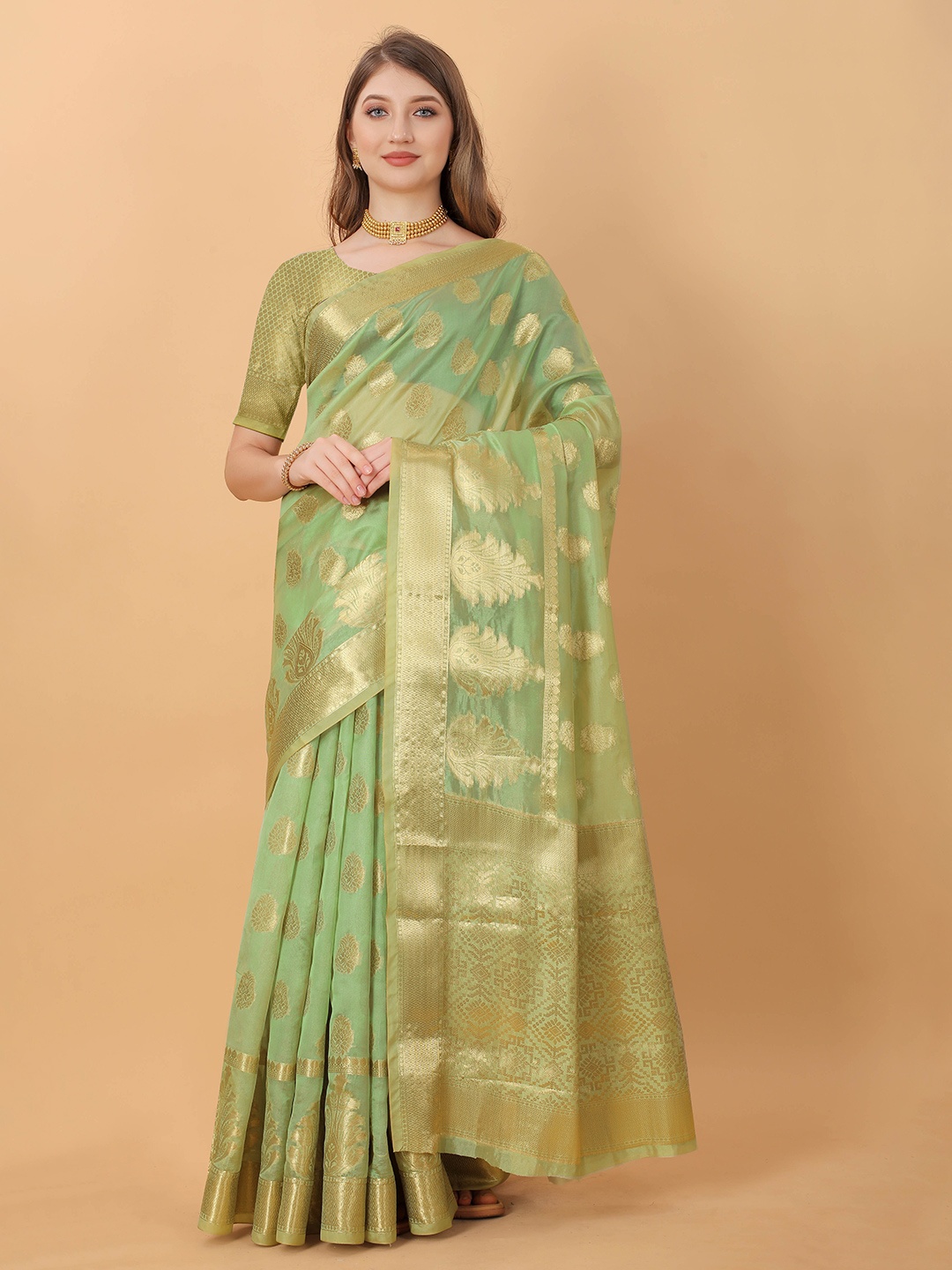

Divyadham Textiles Green & GoldToned Ethnic Motifs Zari Pure Silk Banarasi Saree