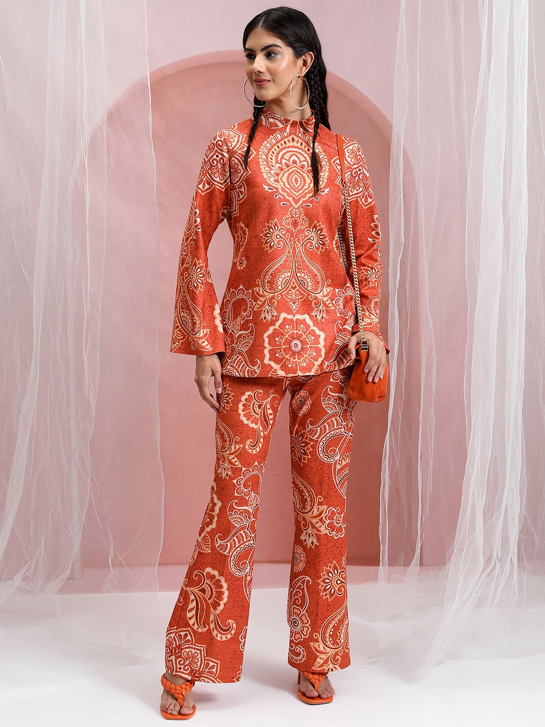 

Vishudh Women Printed Tunic With Flared Pants, Orange