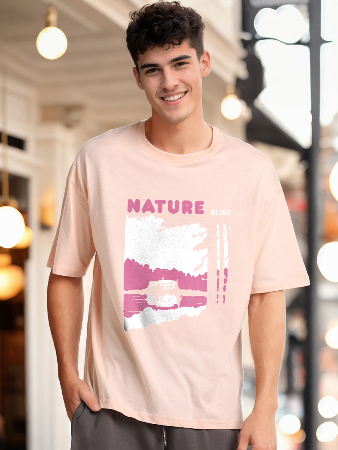 

NOBERO Men Graphic Printed Round Neck Applique Oversized T-shirt, Peach
