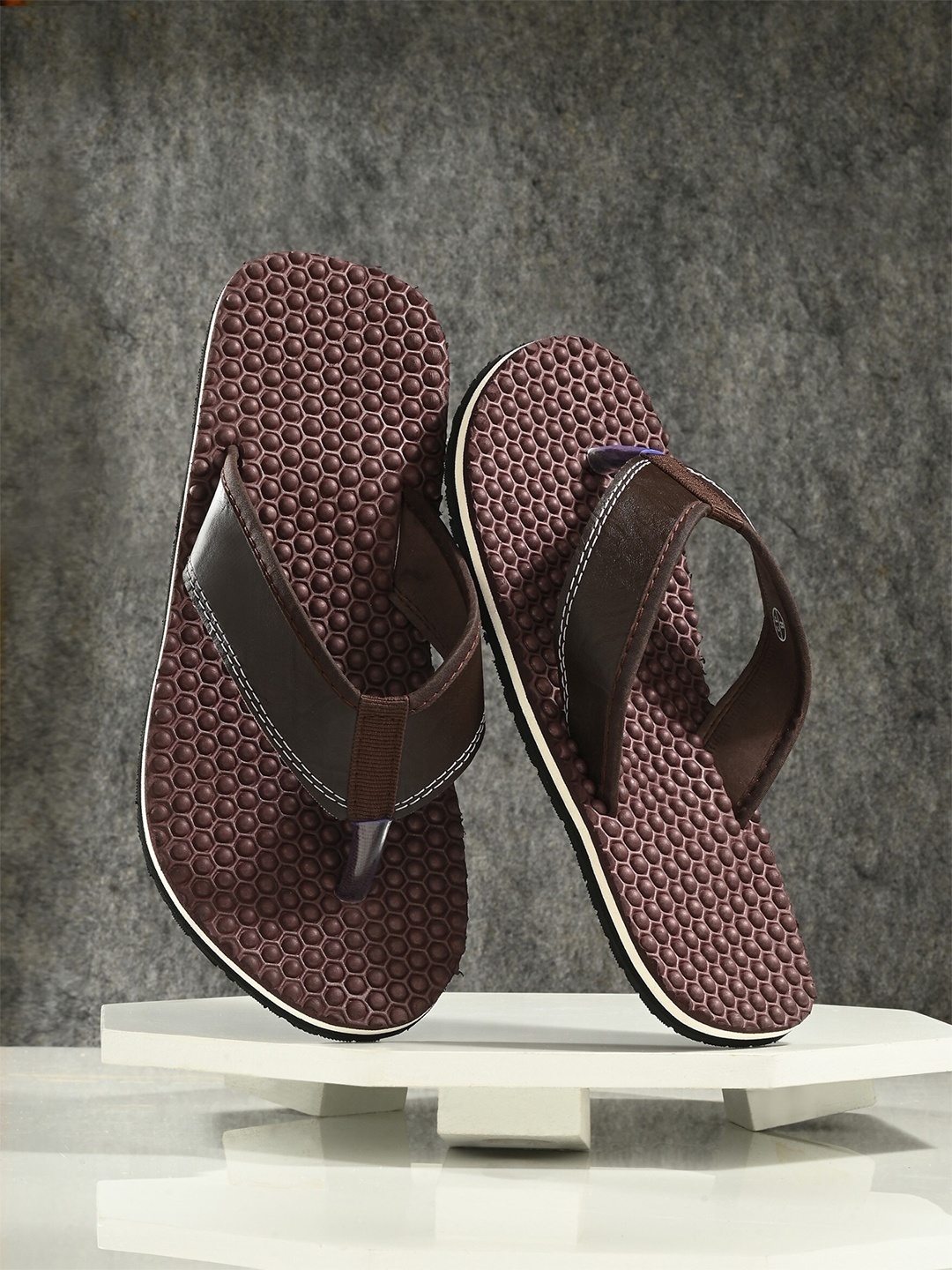 

The Roadster Lifestyle Co. Men Textured Room Flip Flops, Brown