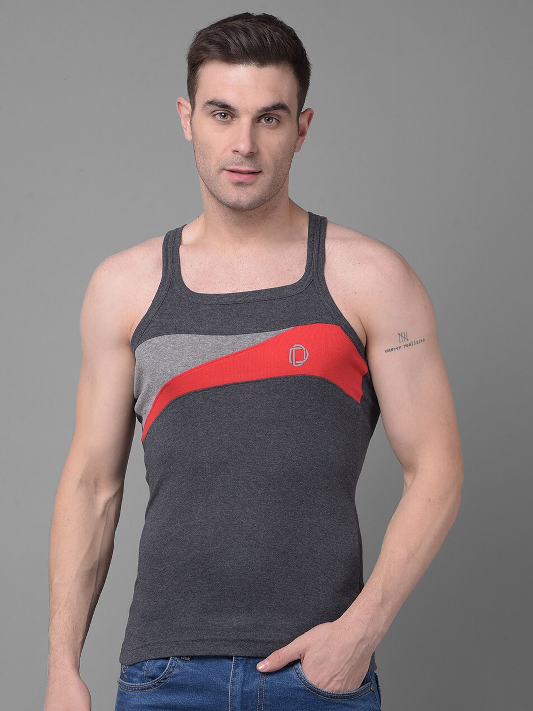 

Dollar Bigboss Men Solid Super Combed Cotton Racerback Styled Gym Vest, Assorted