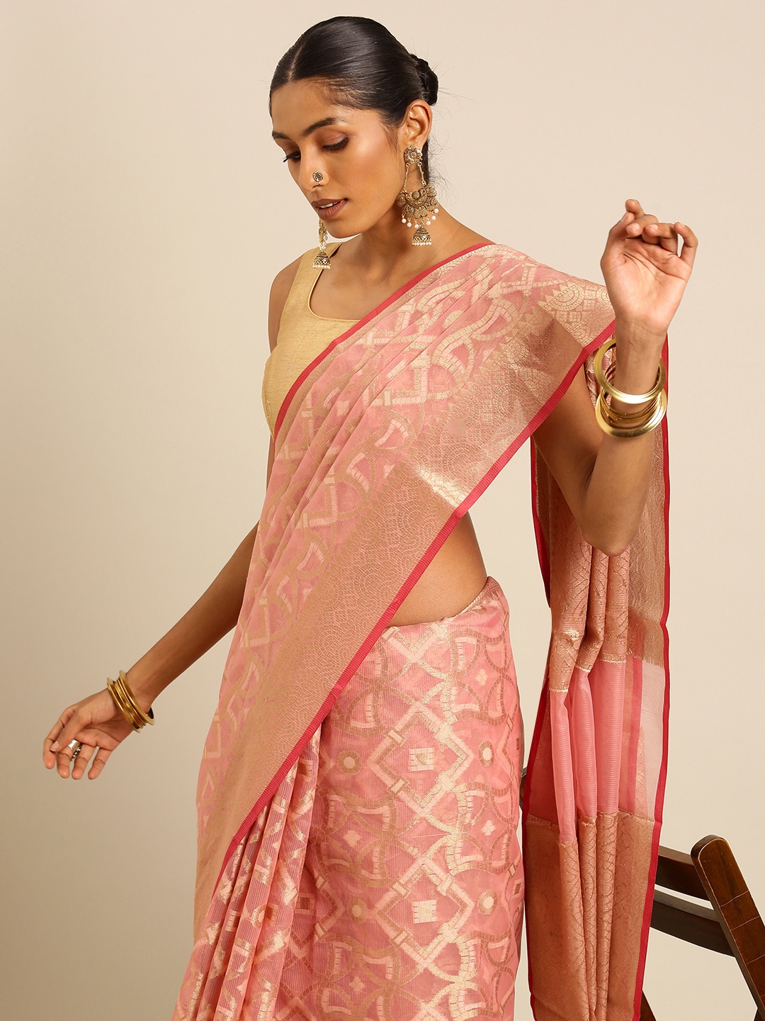 

Taavi Zari Handloom Banarasi Inspired Woven Legacy saree, Peach