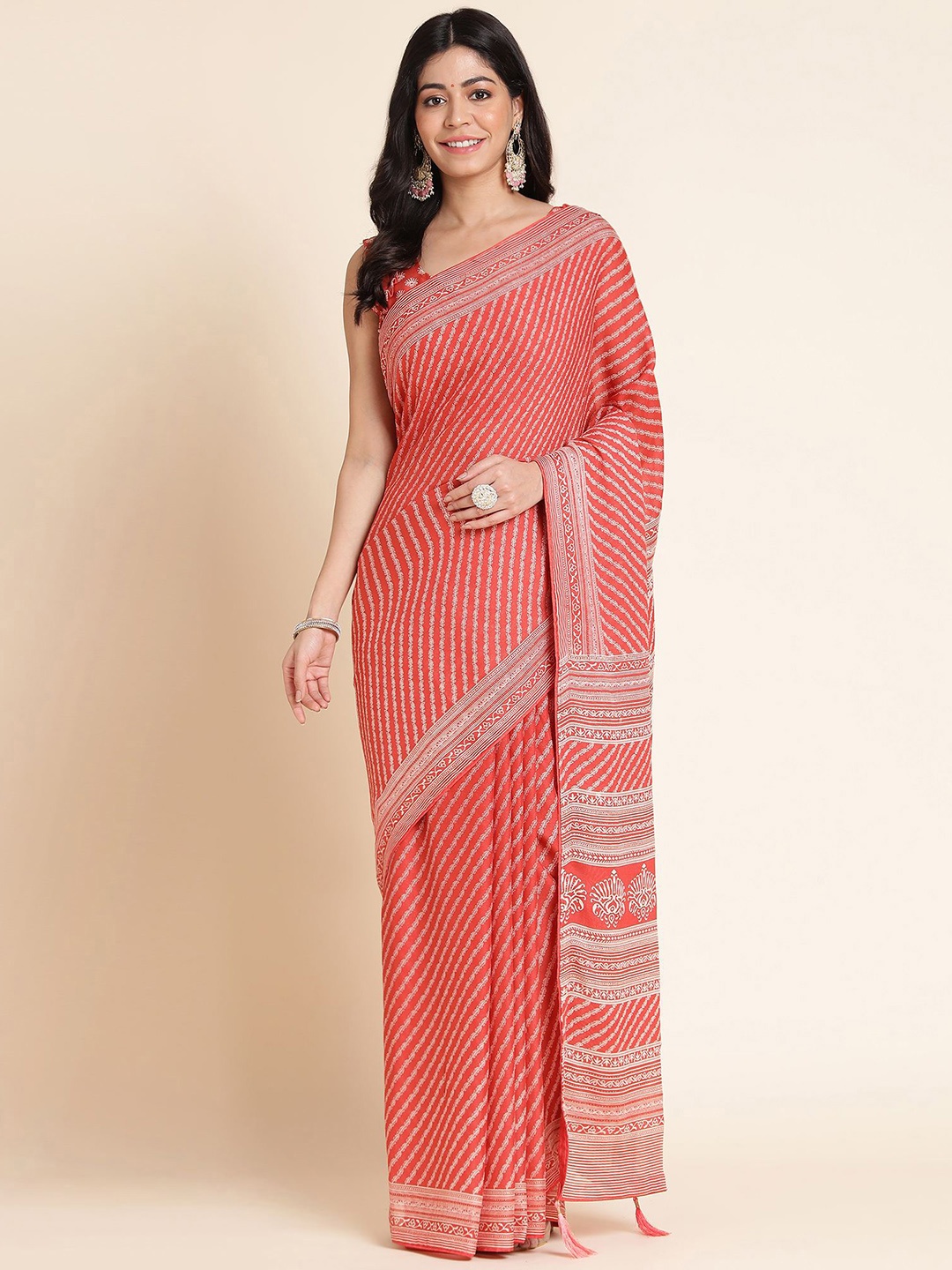 

Mitera Peach Coloured & White Printed Leheriya Saree