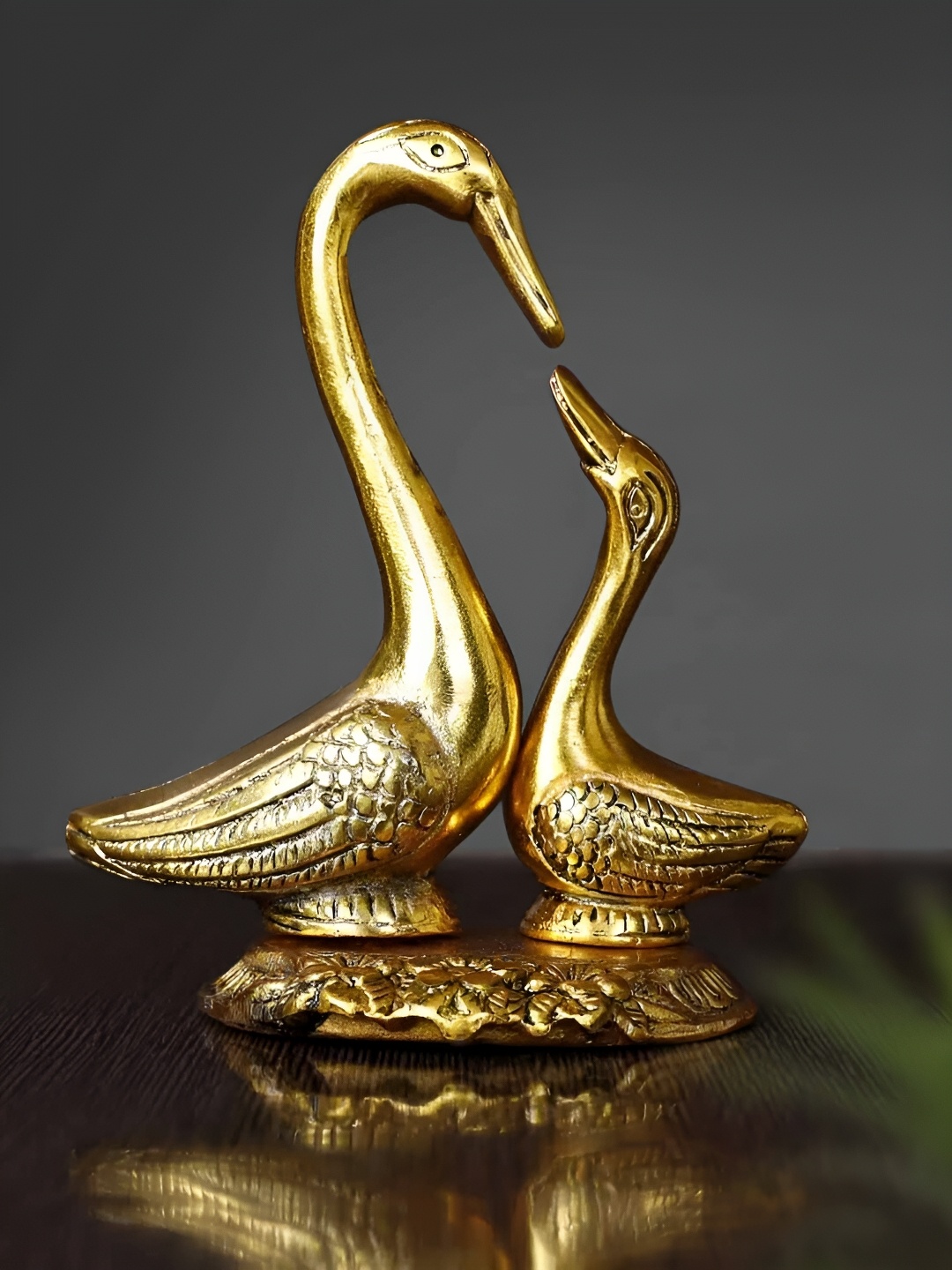 

TIED RIBBONS Gold Toned Metal Showpiece