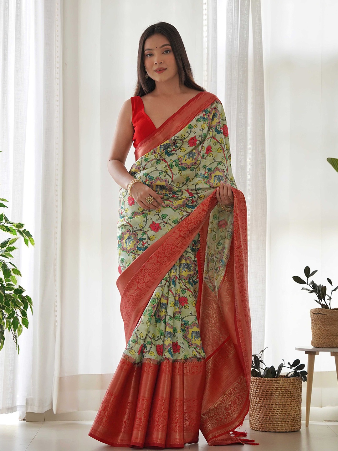 

Mitera Green & Red Kalamkari Printed Woven Design Zari Saree