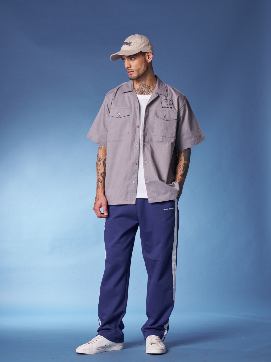 

Bonkers Corner Men Straight Fit Track Pants, Blue