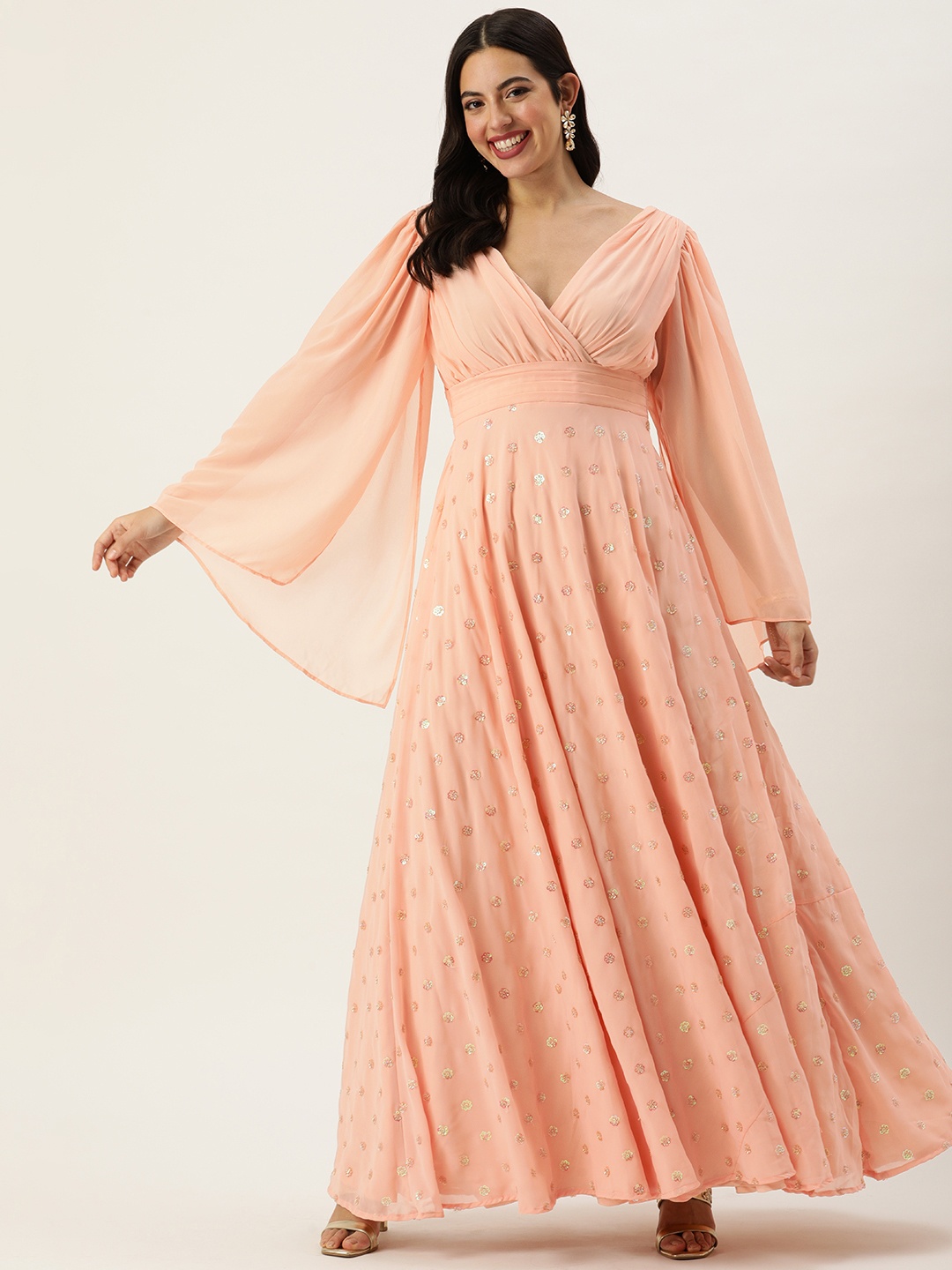 

Ethnovog Floral Embellished Sweetheart Neck Slit Sleeves Georgette Maxi Ethnic Gown, Peach