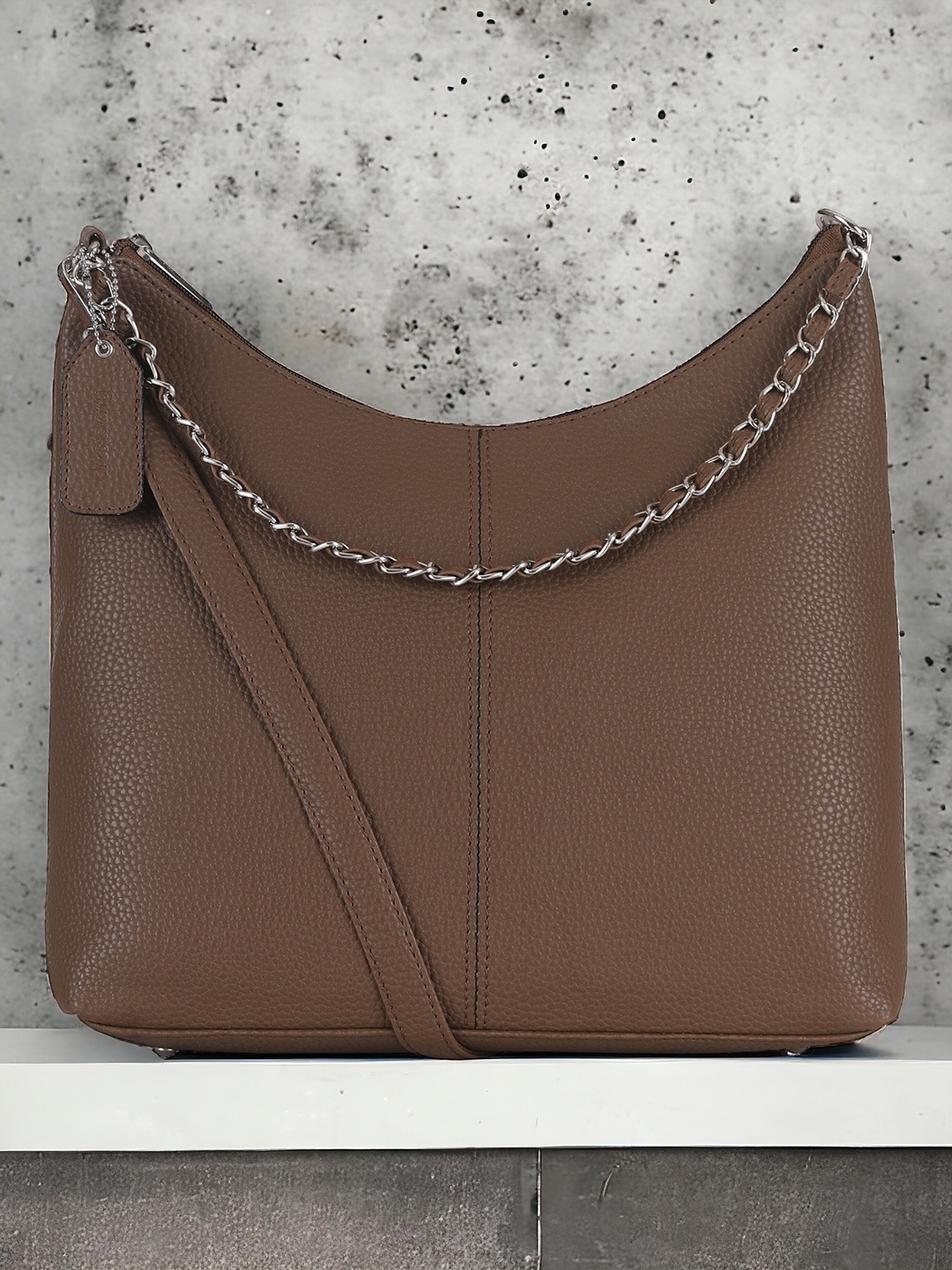 

DressBerry Beige PU Oversized Swagger Sling Bag with Tasselled