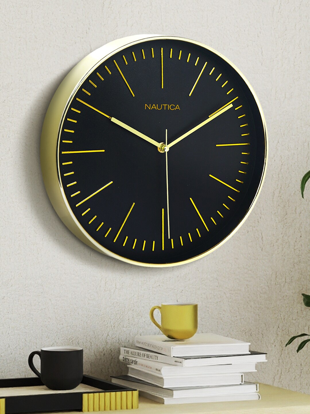 

Nautica Black & Gold Toned Contemporary Analogue Round Shaped Wall Clock