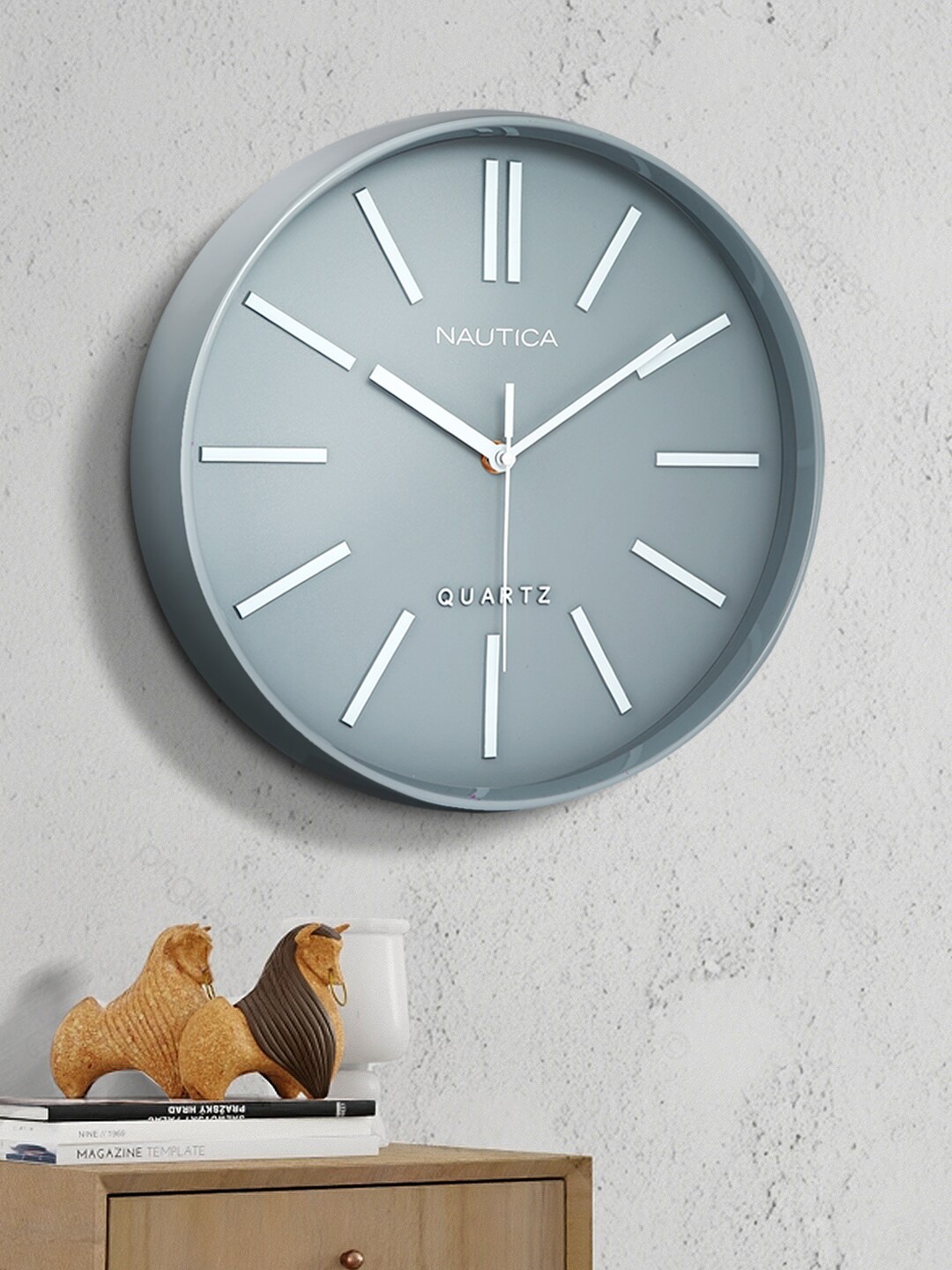 

Nautica Grey & White Contemporary Analogue Round Shaped Wall Clock