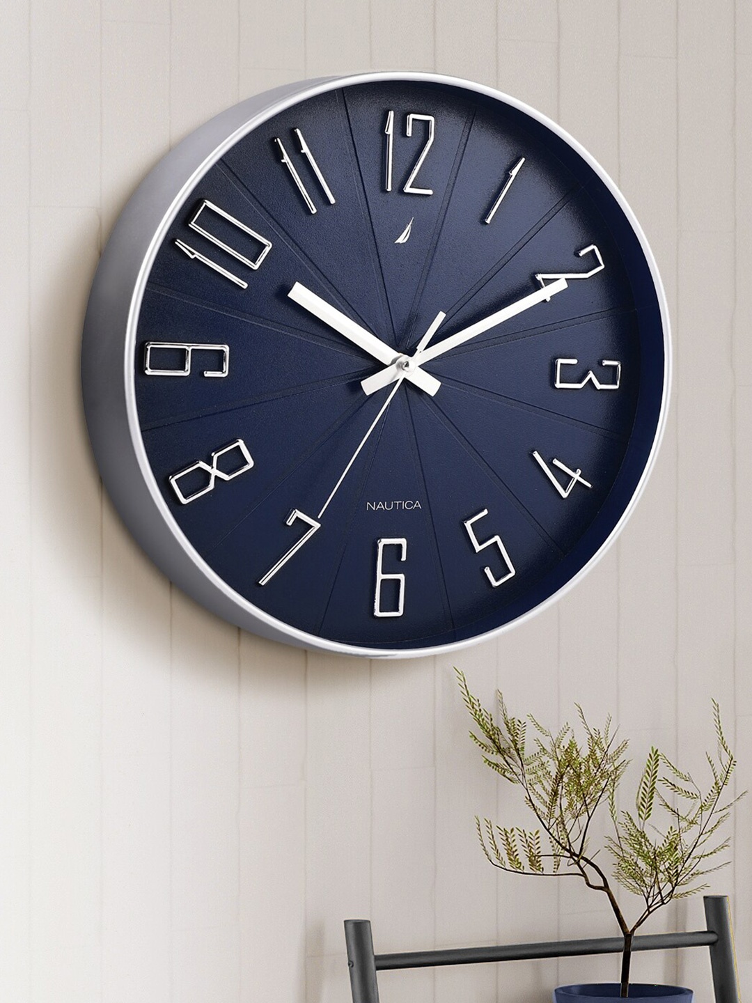 

Nautica Navy Blue & Silver Toned Contemporary Analogue Round Shaped Wall Clock