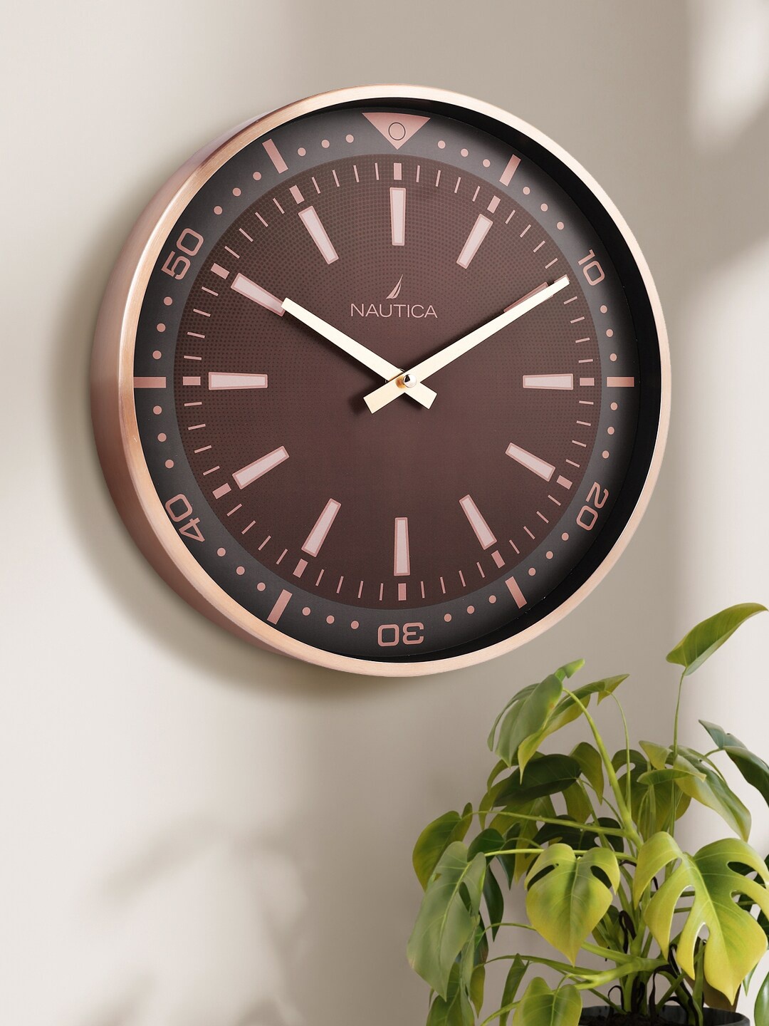 

Nautica Brown Contemporary Analogue Round Shaped Wall Clock
