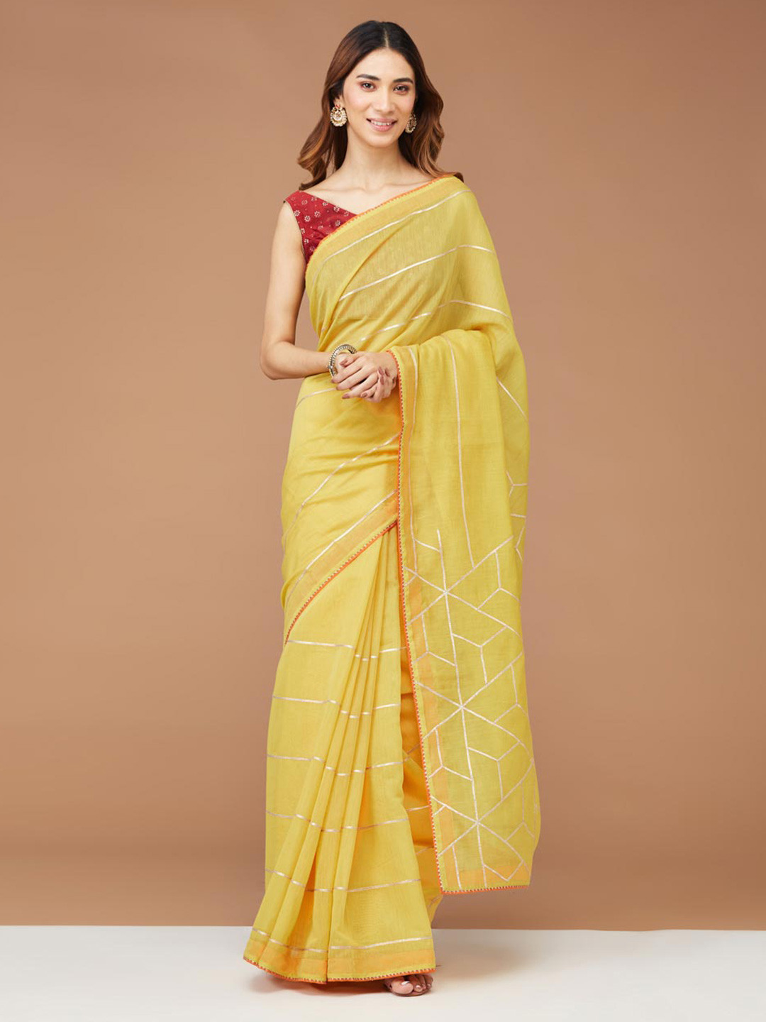 

Fabindia Striped Embellished Gotta Patti Silk Cotton Saree, Yellow