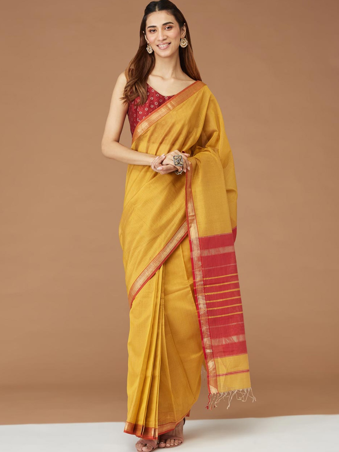 

Fabindia Mustard & Red Striped Silk Ethnic Woven Stitched Cotton Saree