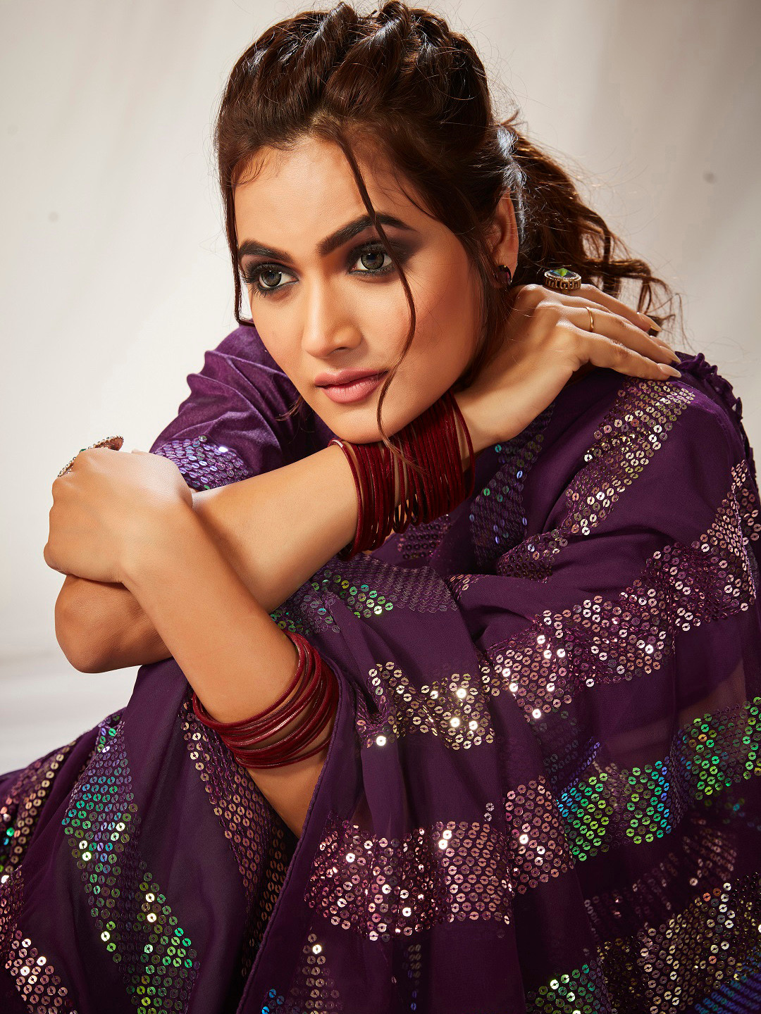 

Kalista Purple & Green Embellished Sequinned Pure Georgette Saree