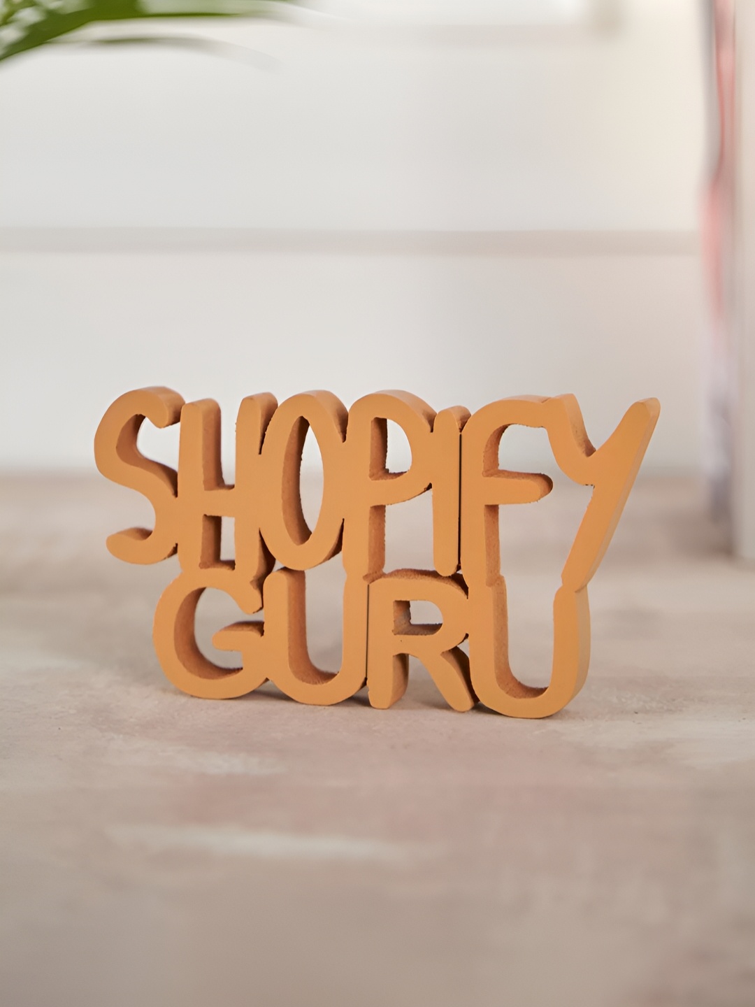 

DecorTwist Orange Quote Wooden Table Decor Showpiece